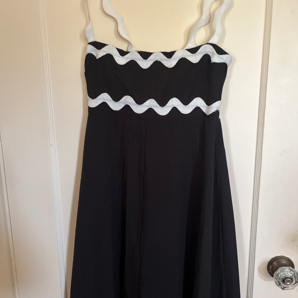 Black dress with wave white trim